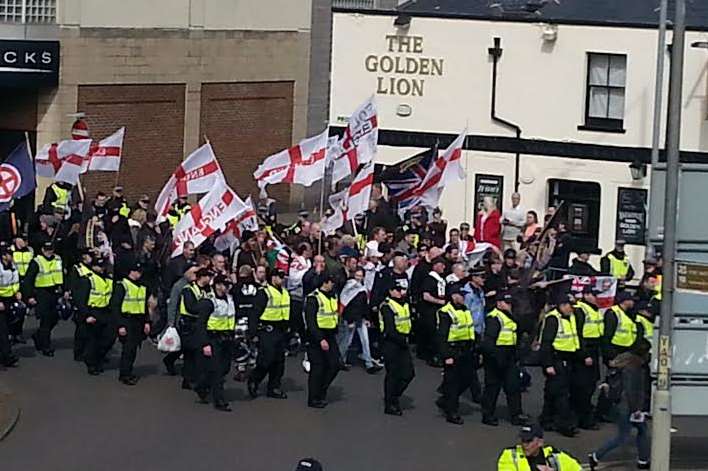 Far-right protestors march towards the port of Dover