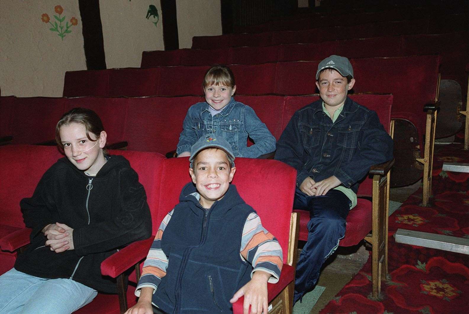 First in the queue at Faversham cinema: Paulline Geffroy, 12, Alice Stephens, 9, and Harry and Joe Clarke, aged 9 and 12