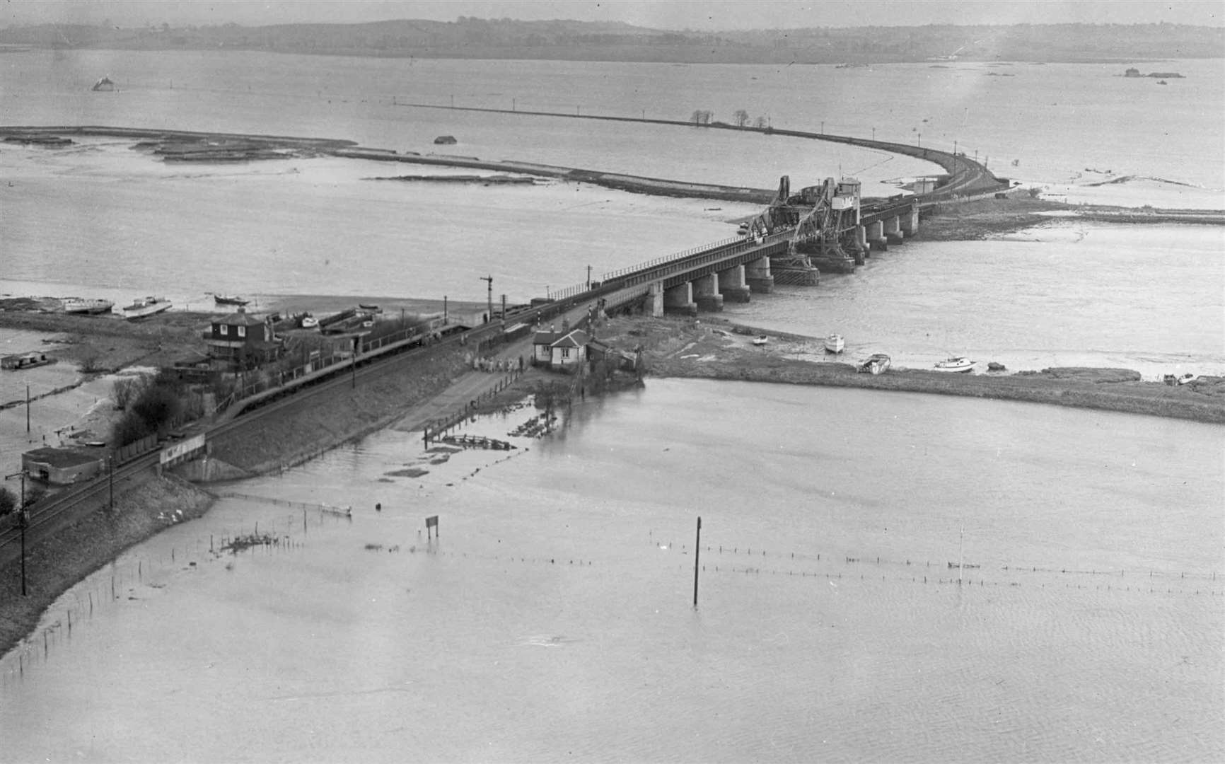 The Isle of Sheppey was completely cut off, isolating some 25,000 people. The flood waters severed road and rail links to the island at Kingsferry Bridge
