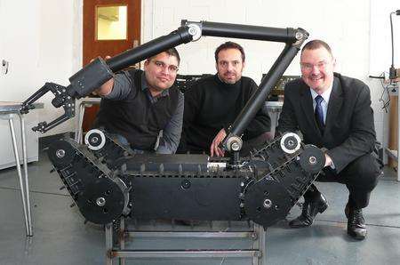 Experts with the bomb disposal robot designed at the University of Greenwich at Medway
