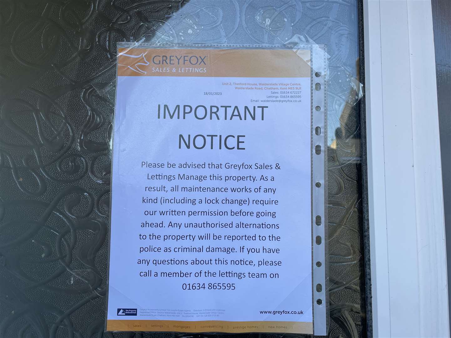 The notice by Greyfox Sales & Lettings on Mrs Wareham's home door