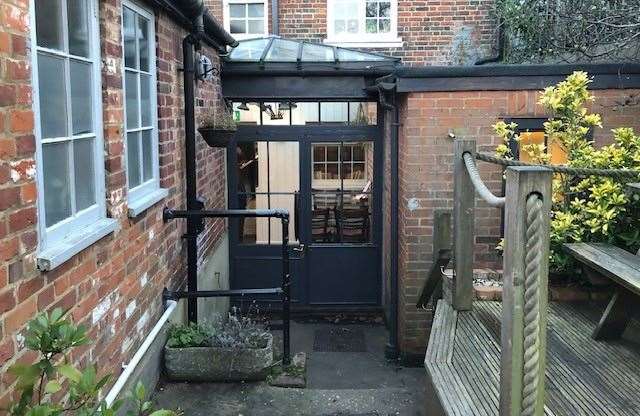 This light and airy conservatory room at the back of the pub leads straight into the garden