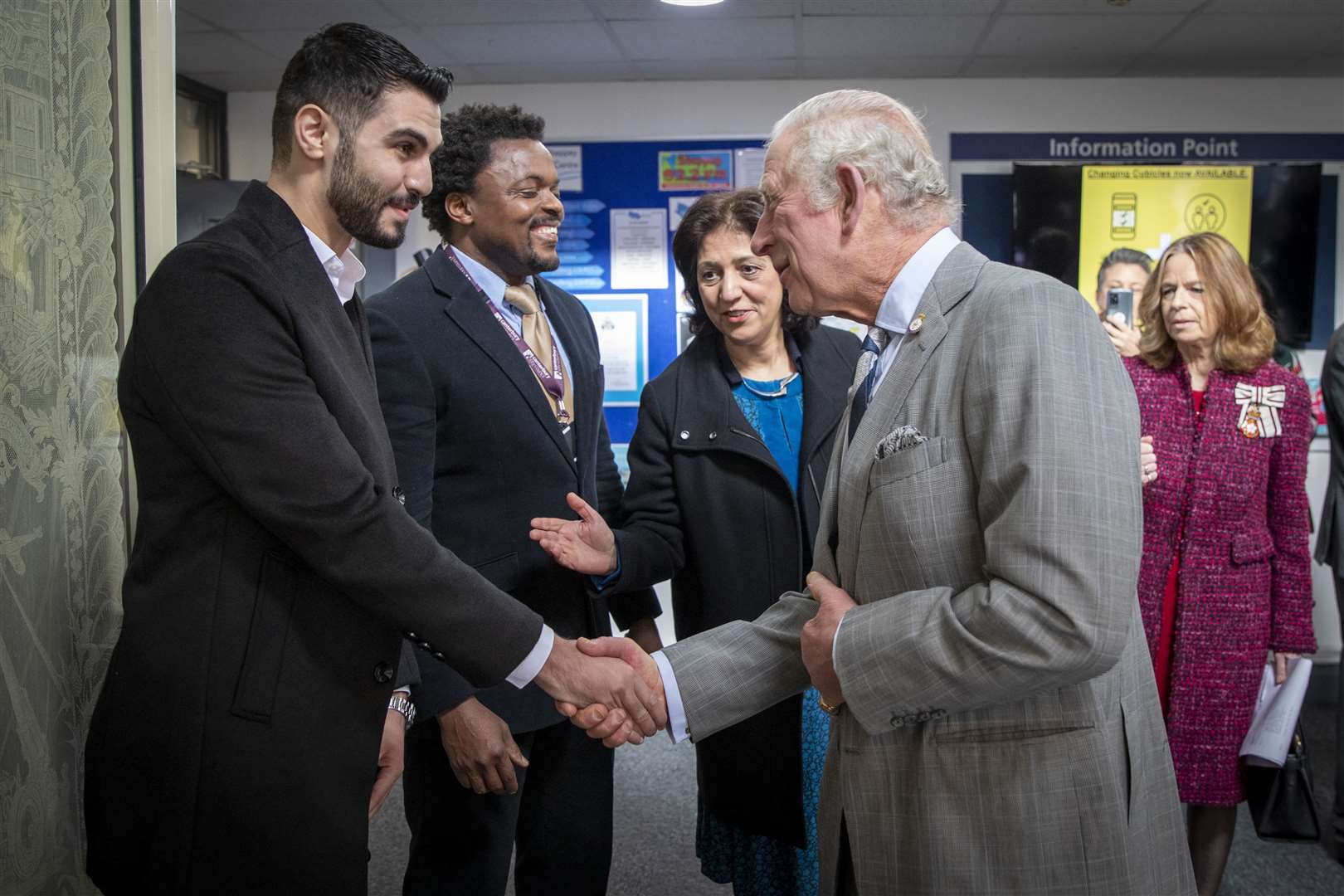 Osama Sharkia an Ambassador for Kent Refugee Action Network ‘KRAN’ and Fawzia Worsley Youth Support and Outreach Worker at KRAN meeting His Royal Highness The Prince of Wales. Picture by Andy Aitchison