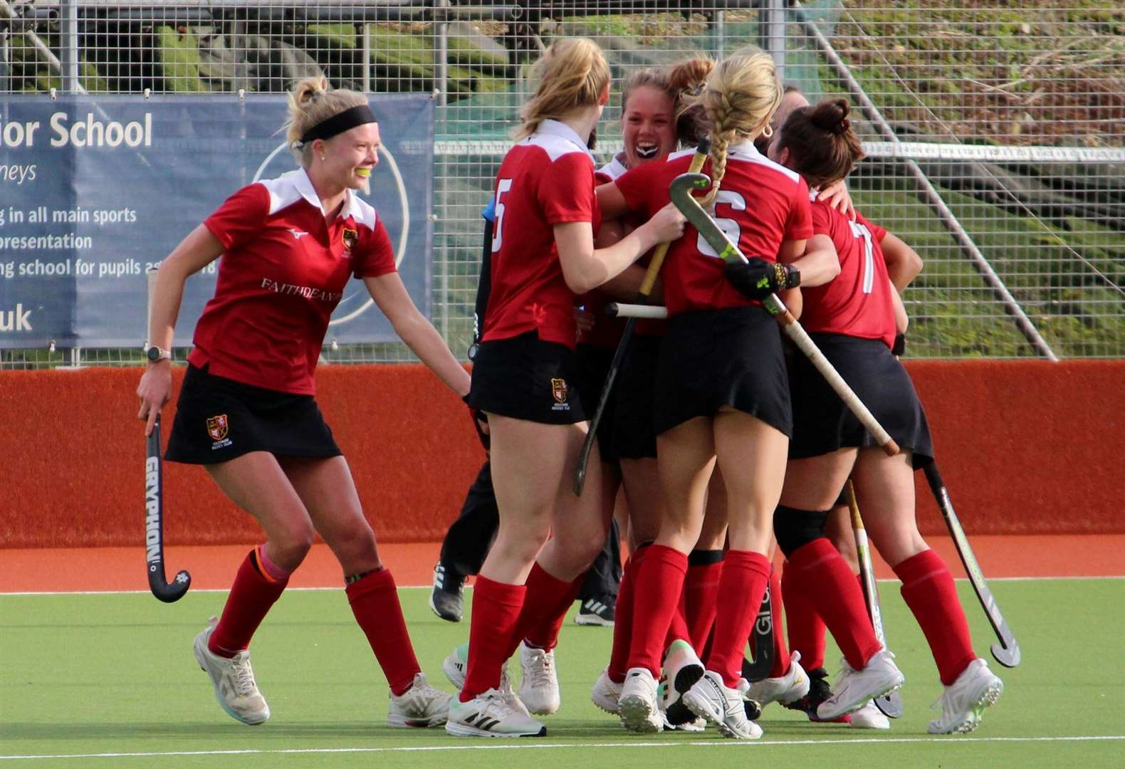 Holcombe Women celebrate scoring against Surbiton 2s on Sunday Picture: Jon Goodall