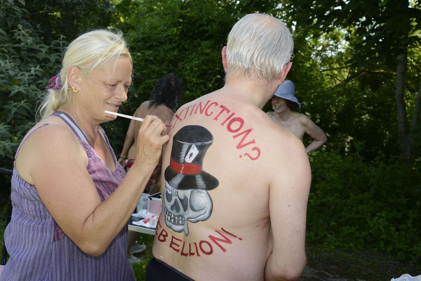 Cyclists used body paint to promote their message. Picture: Paul Amos