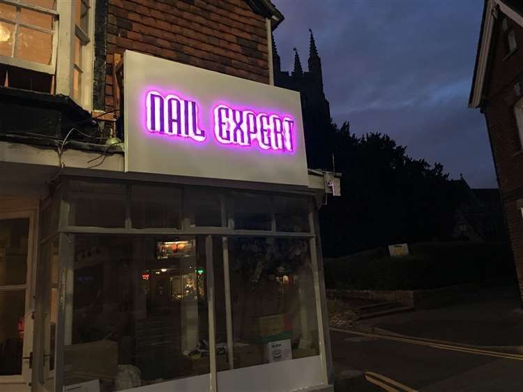 The neon sign with St Mildred's in the background (14852697)