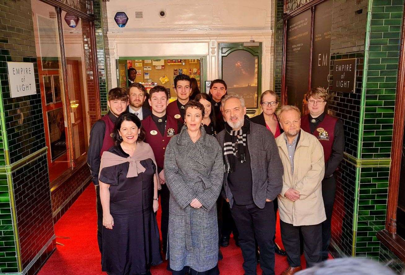 Empire of Light stars Pippa Harris, Olivia Coleman, Sam Mendes and Toby Jones with staff at The Carlton cinema in Westgate