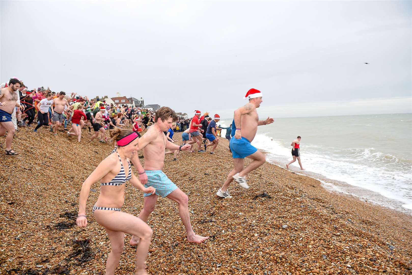 Hundreds of people took part in the Boxing Day Dip in Deal in 2019 Picture: Alan Langley