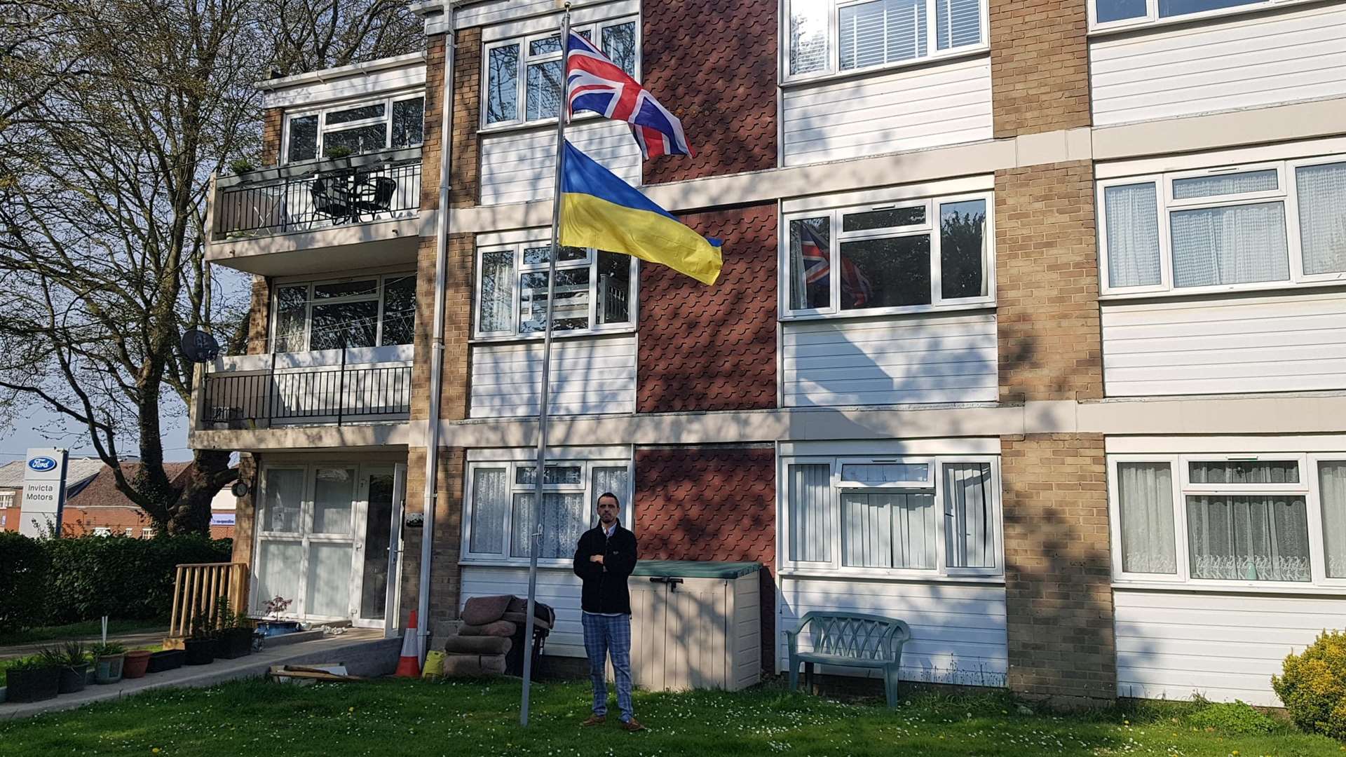 Nigel Hart with his flag, just off Sturry Road, Canterbury