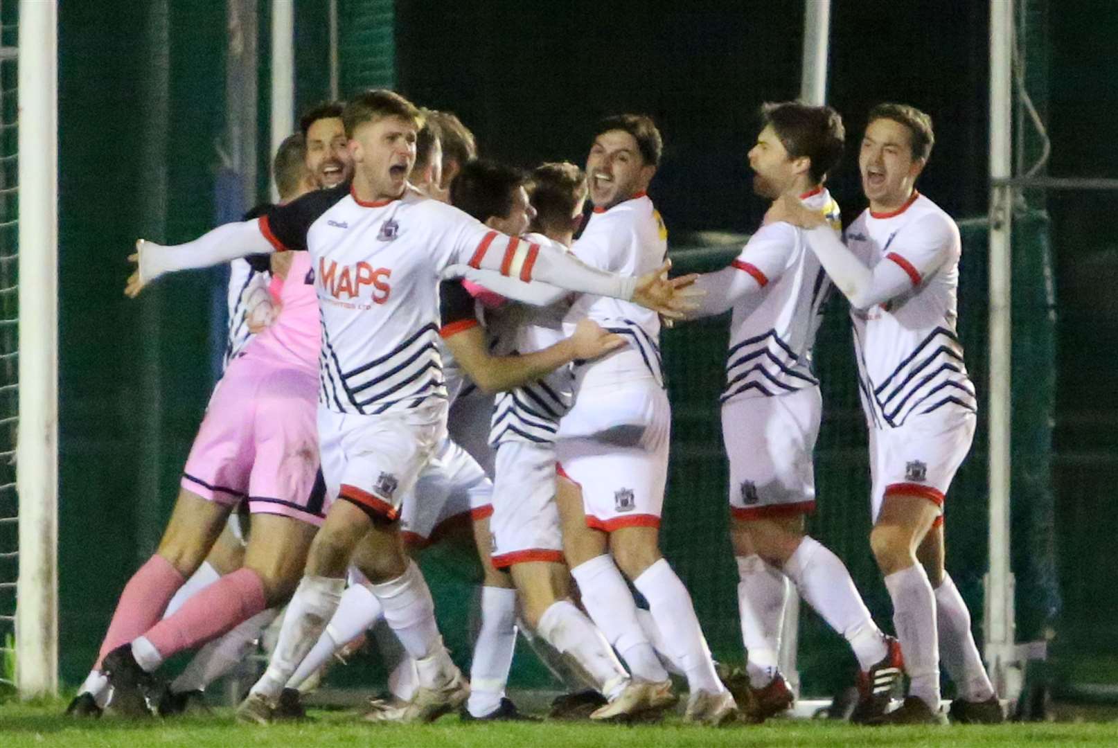Deal's players celebrate winning their penalty shoot-out win at Sporting Bengal on Saturday. Picture: Paul Willmott