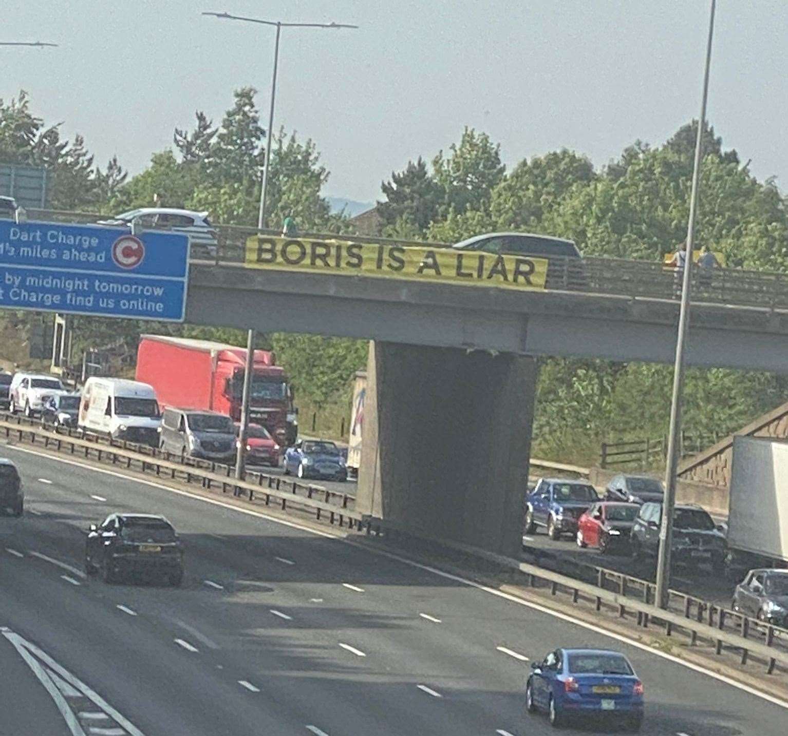 A banner which read Boris is a liar was spotted on an M25 flyover on the Dartford Tunnel approach. Photo: Darren Povey
