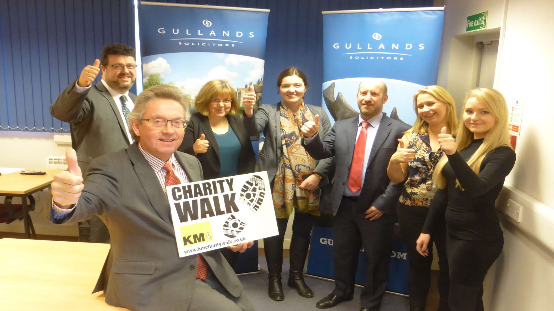 Blair Gulland and staff from Gullands announce support of the KM Charity Walk.