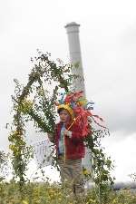 Immy, five, with the wreath created by the Stop Incineration Now Network. Picture by John Westhrop