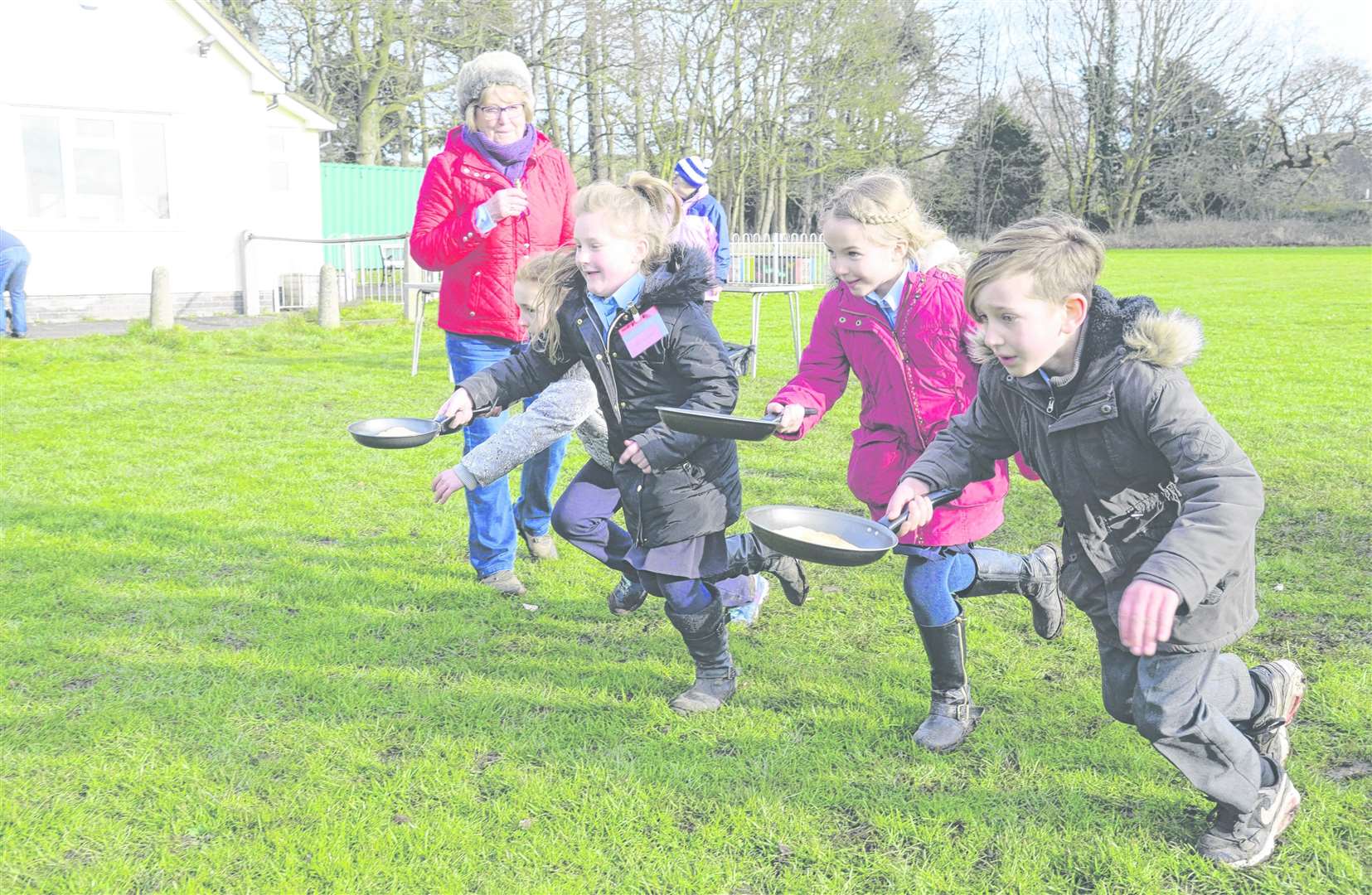 And they're off... children from Hollingbourne School in action during the Hollingbourne WI pancake races last year Picture: Chris Davey