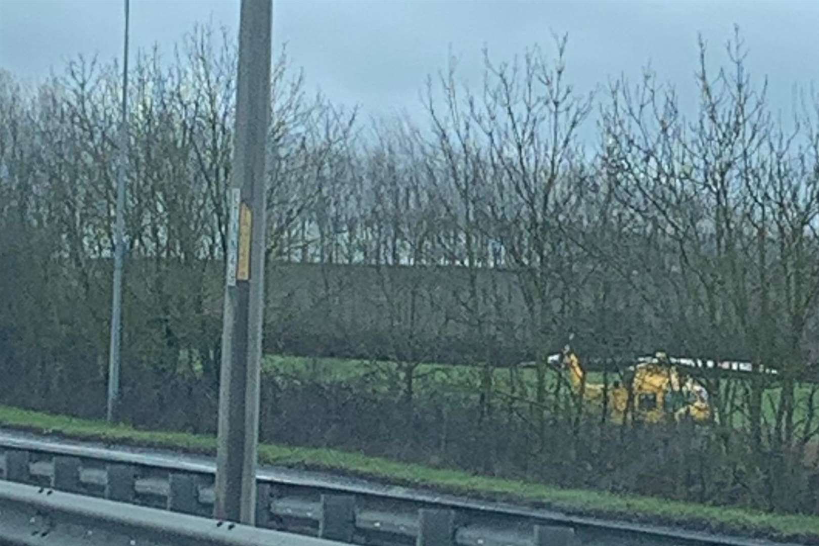 An air ambulance has landed near the crash. Picture: Jane Lynch