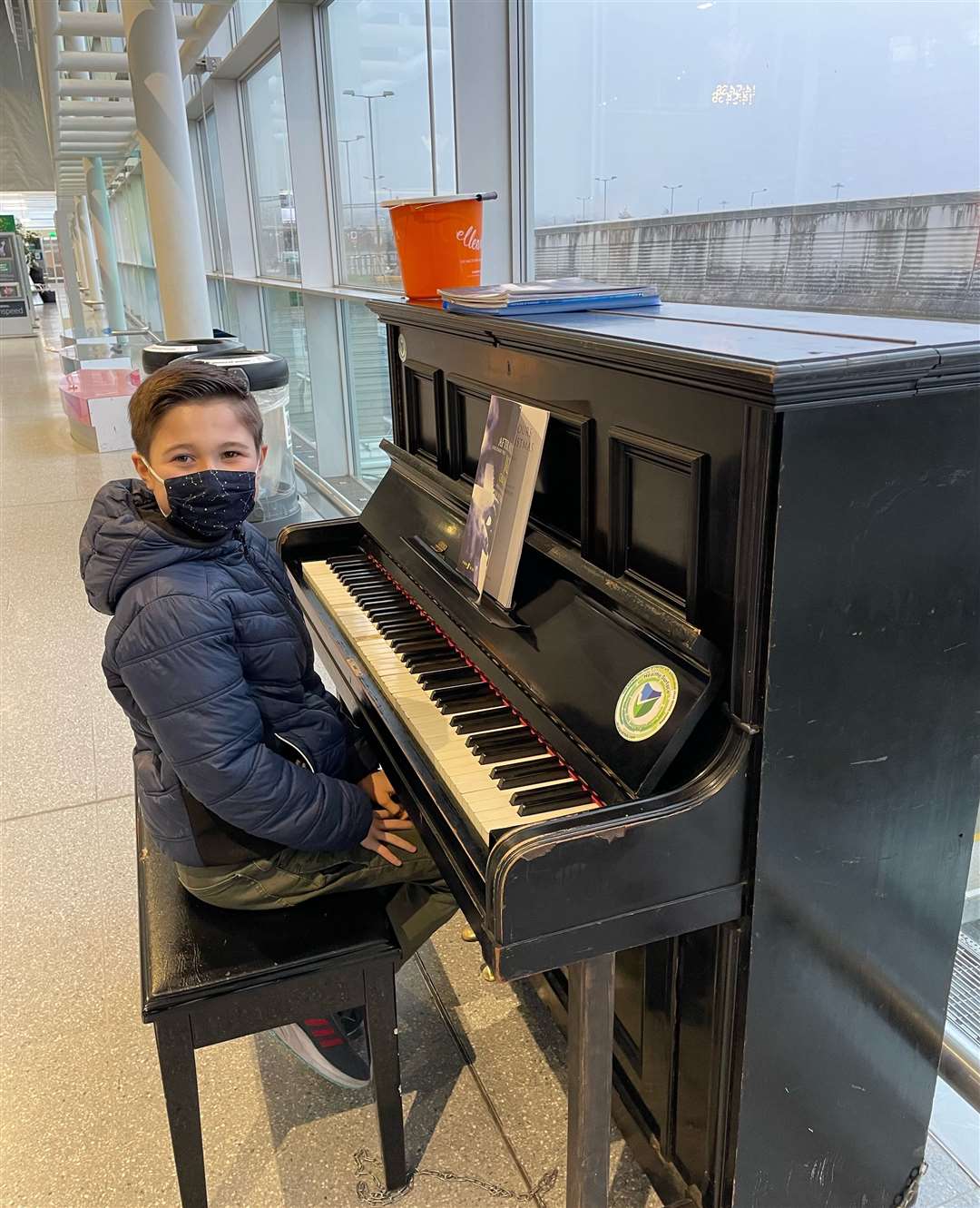 Talented pianist Jesse Bradley, 12, performed at Ebbsfleet International Station to raise money for ellenor Hospice in Northfleet. Photo: Kathleen Bradley