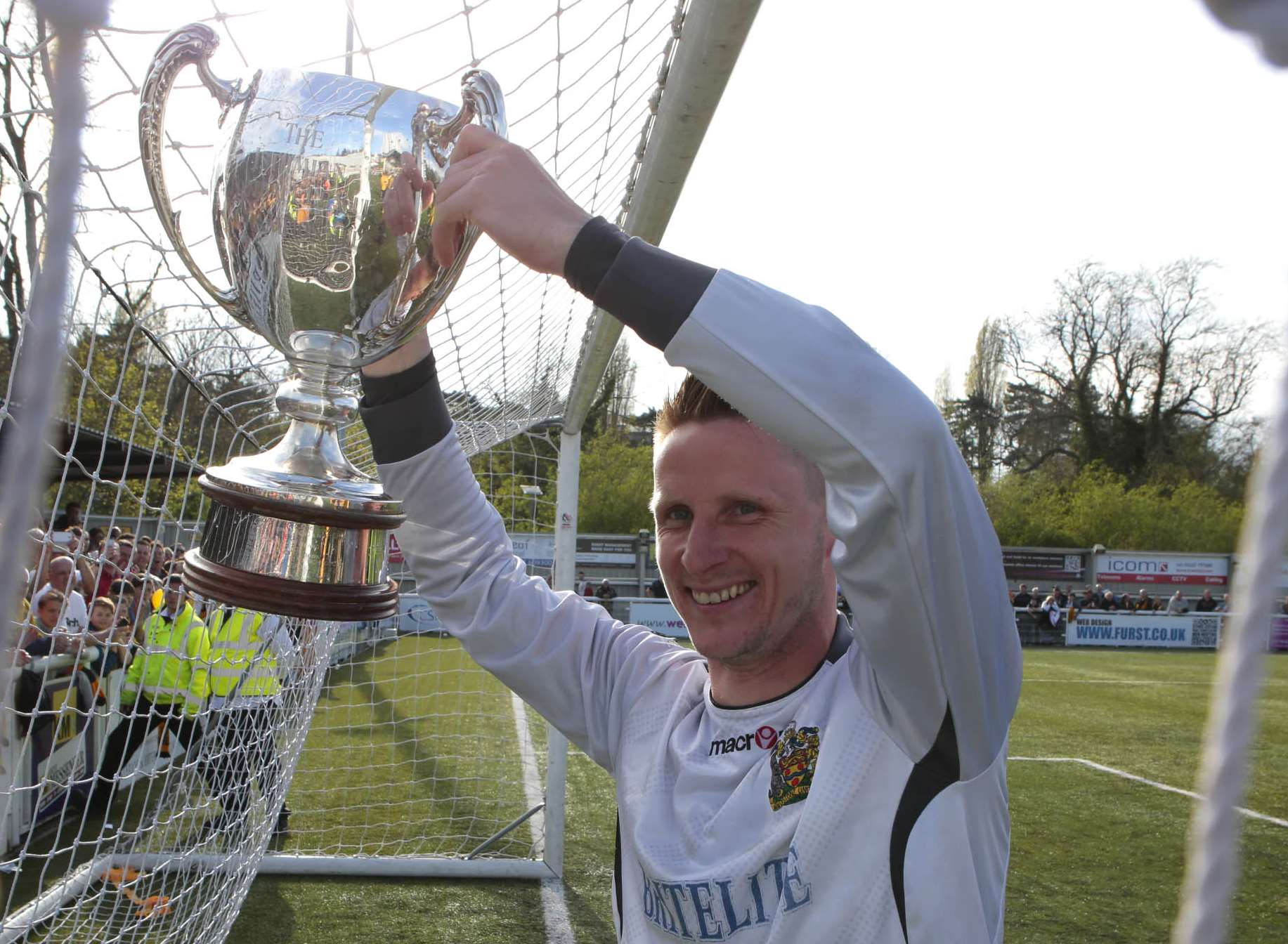 Keeper Lee Worgan celebrates with the trophy. Picture: Martin Apps