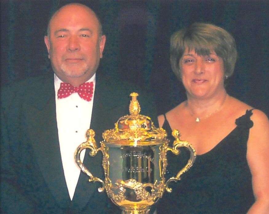 Gerry Lawson and his wife pictured with the Rugby World Cup after its visit to Sheppey following the 2003 win