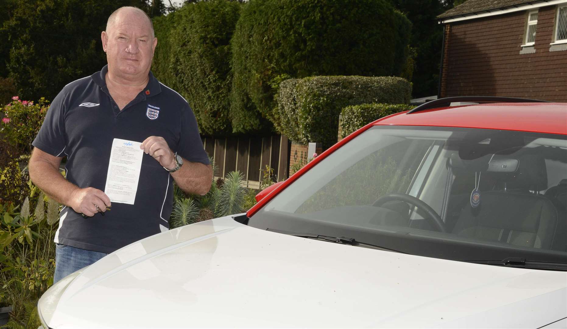 Gary Walker with the parking ticket which has now been cancelled