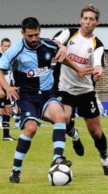 Nicky Southall (right) challenges for possession in the pre-season friendly against Wycombe Wanderers