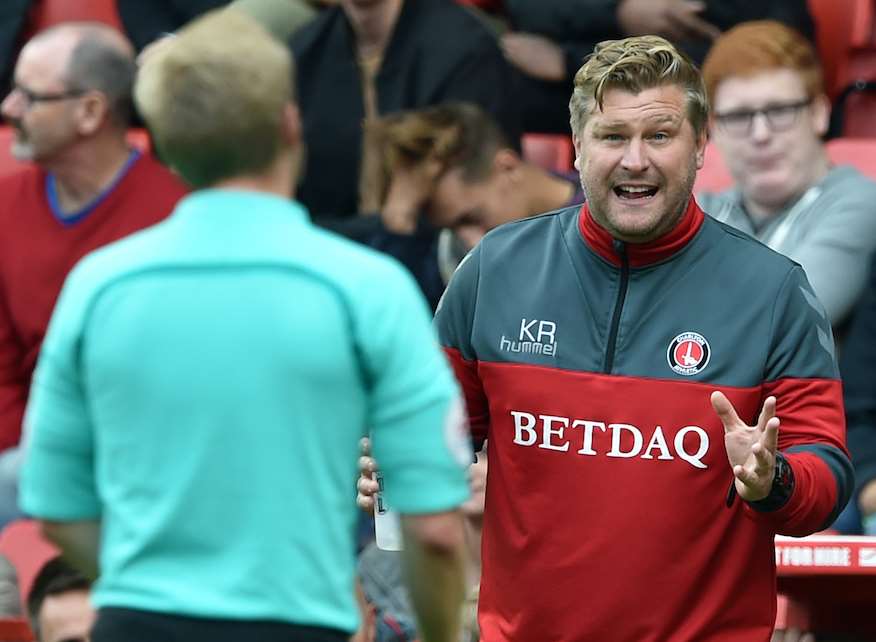 Charlton boss Karl Robinson makes his point to the official. Picture: Keith Gillard