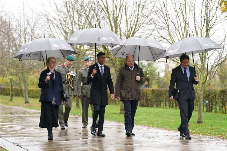 Prime Minister Rishi Sunak, Defence Secretary Ben Wallace, and Minister for Veterans’ Affairs, Johnny Mercer (right), at the National Memorial Arboretum. Photo Joe Giddens/PA
