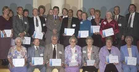 Some of last year's award winners with their certificates
