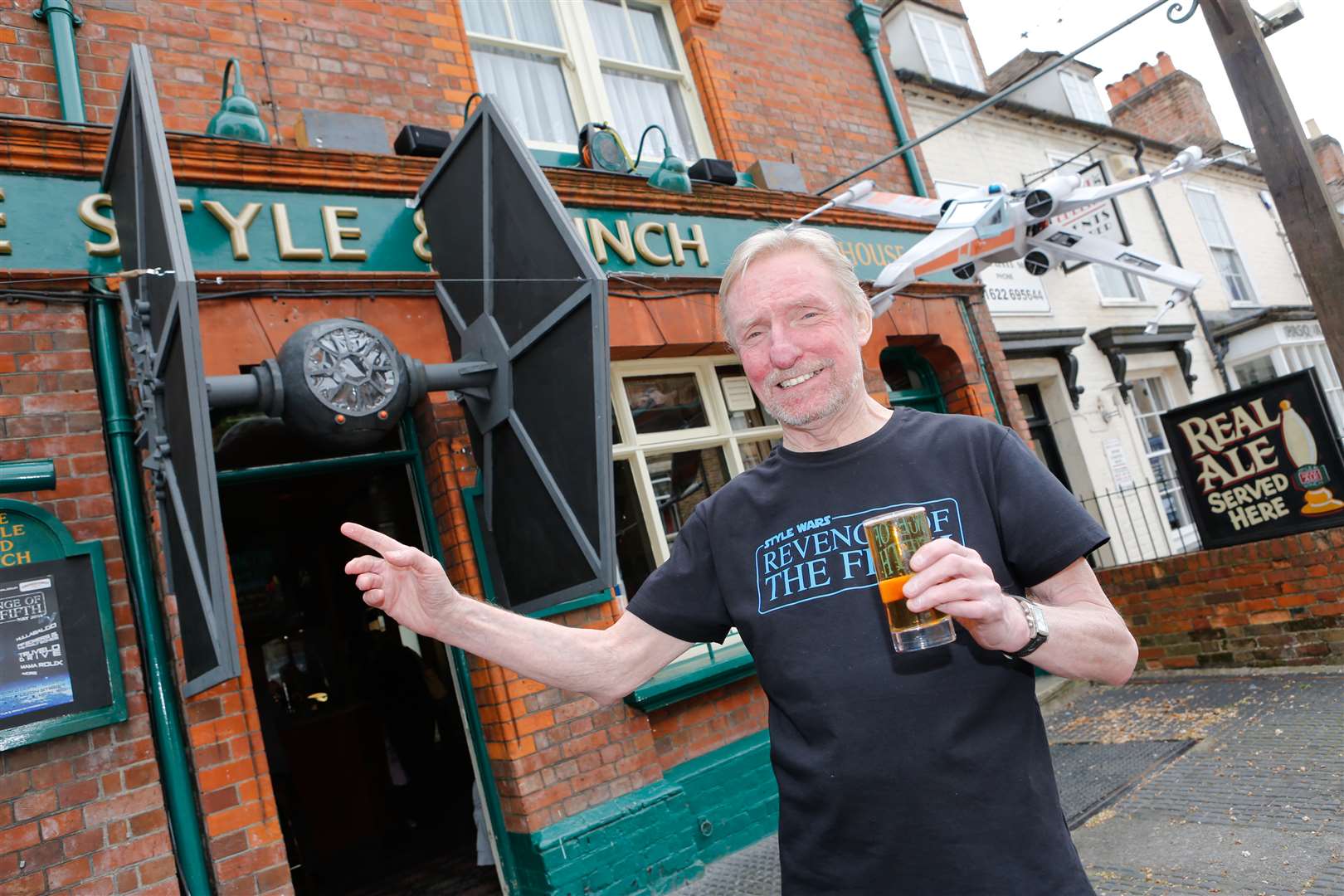 Landlord Dave Savory outside the Style and Winch pub