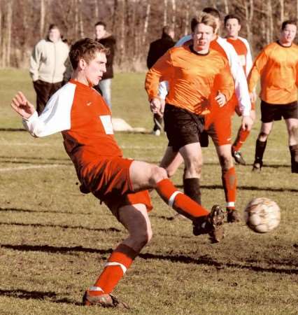 FC Longfield (red) take a shot against Old Prince of Orange