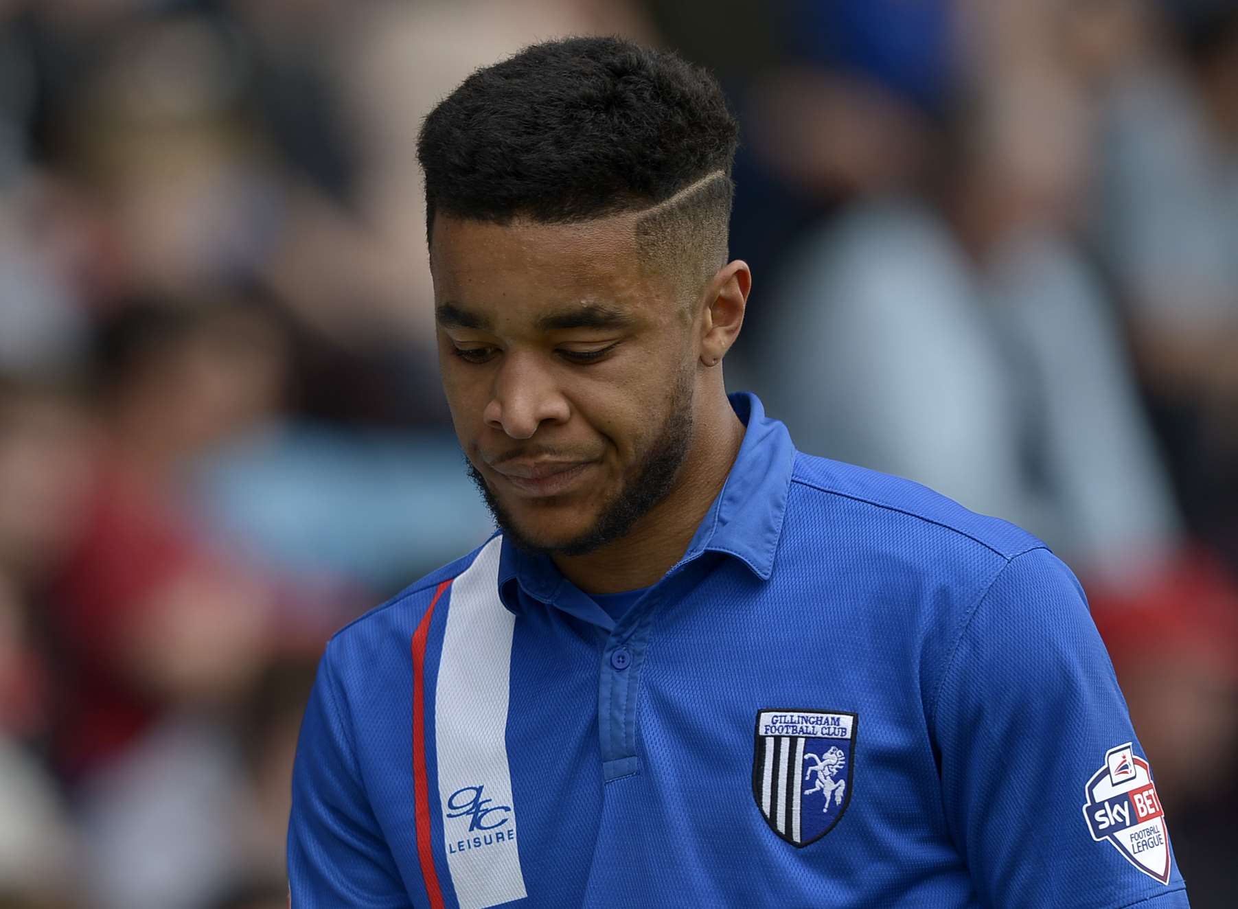 Dominic Samuel leaves the field after a knee injury against Coventry Picture: Barry Goodwin