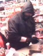 Another image of the man whose jacket and gloves were too short, leaving his wrists exposed