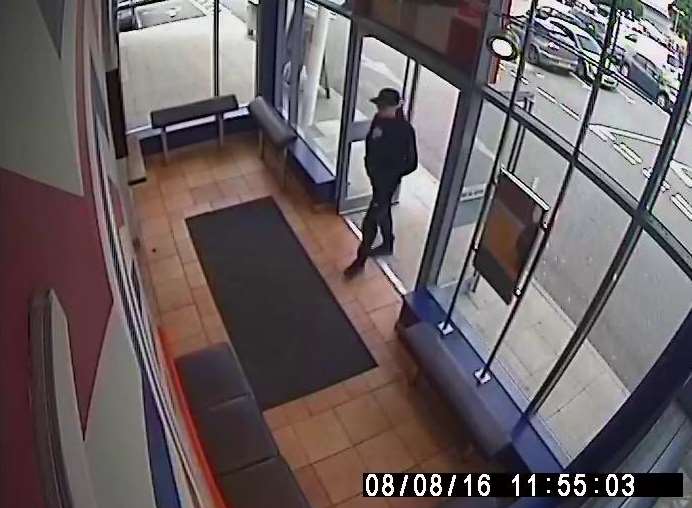 Officers have released an image of a man they would like to speak to in connection with a robbery at a business in Dartford.