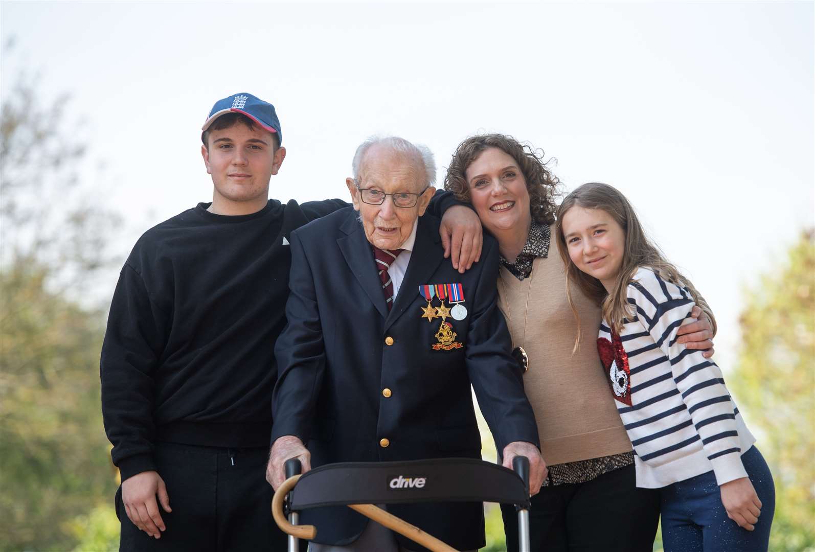 Captain Sir Tom Moore will be joined by his grandson Benji, daughter Hannah Ingram-Moore, and granddaughter Georgia (Joe Giddens/PA)