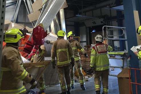 The floor collapsed at the Claygate warehouse. Picture: @kentfirerescue