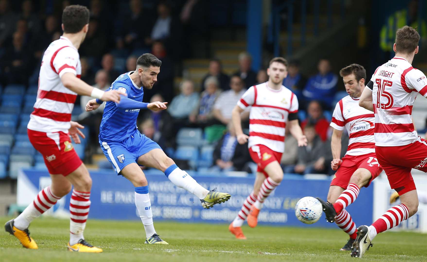 Gillingham forward Conor Wilkinson goes for goal. Picture: Andy Jones