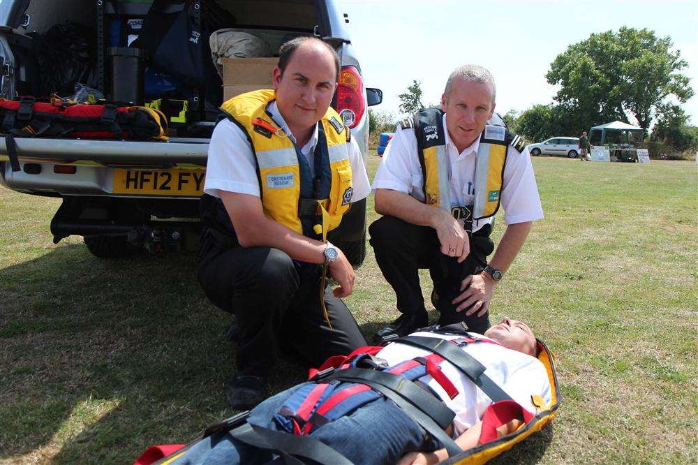 James Crane and Tim Judge of Sheppey Coastguard with Lee Judge in a Troll Stretcher