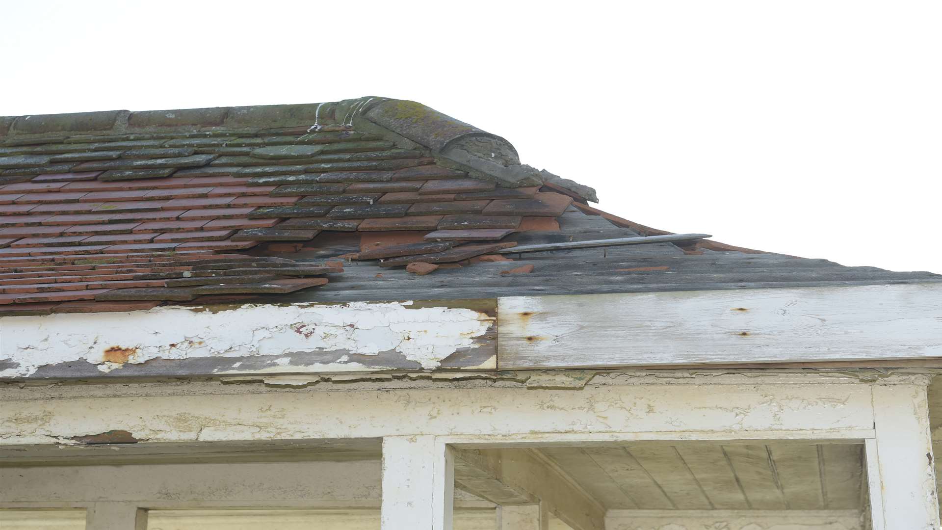 A close-up of damage to one of the shelters