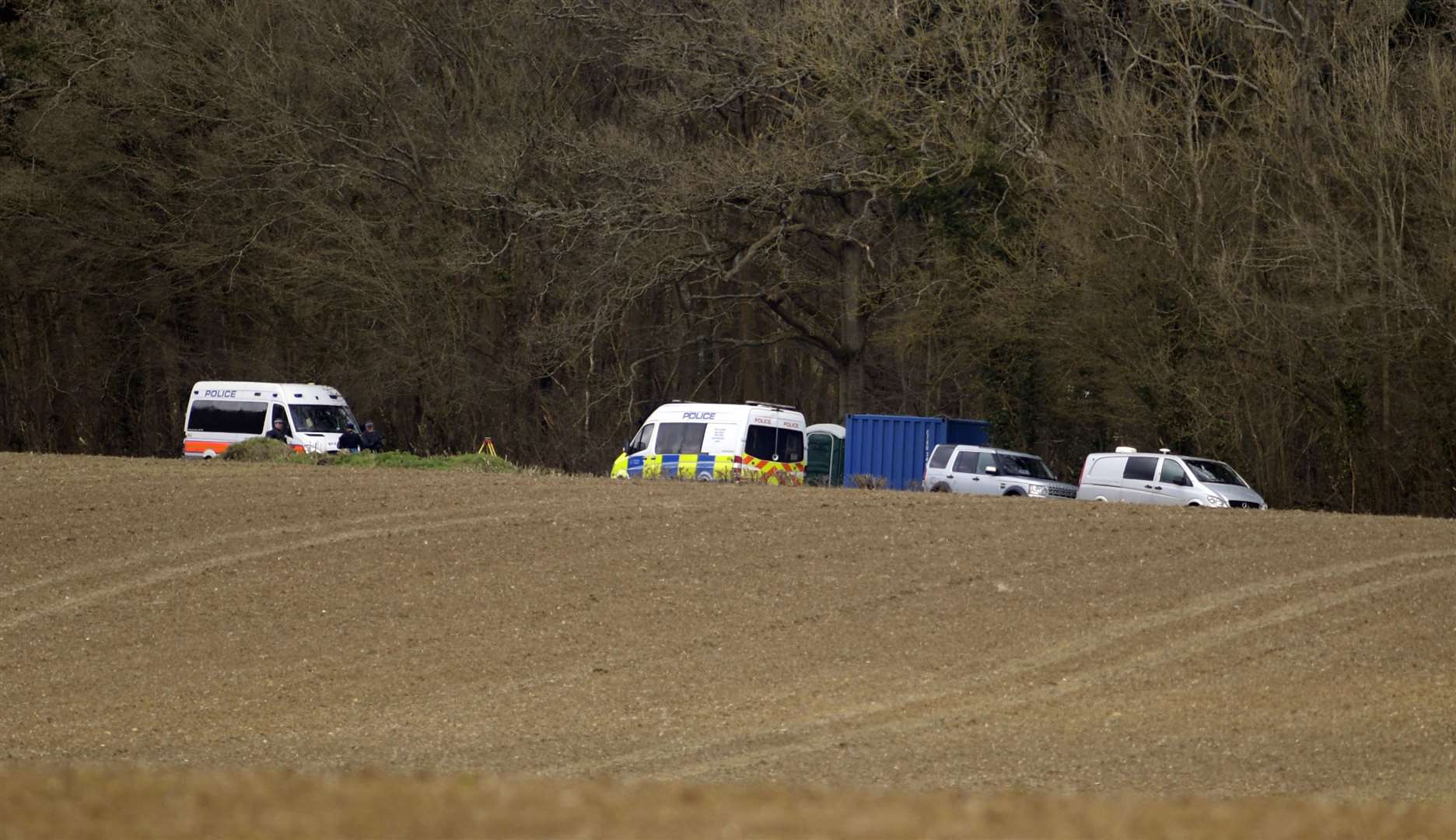 Police searching woodland off Fridd Lane behind the Great Chart Golf and Leisure complex. Picture: Barry Goodwin