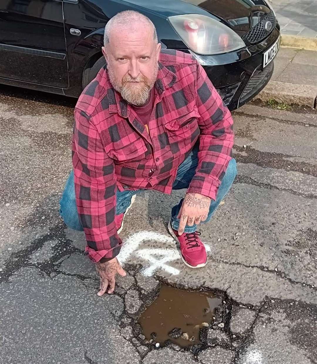 Ian Maggs planned to fill the potholes himself in Cowper Road, Sittingbourne