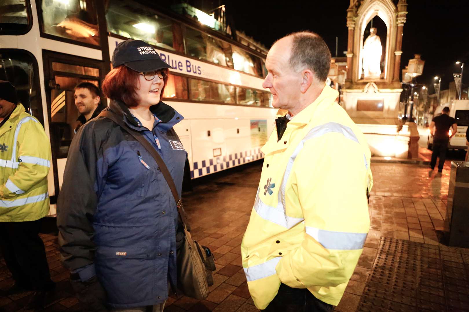 Street pastor Michelle Sheehan speaks to Paul Alcock of the Urban Blue Bus