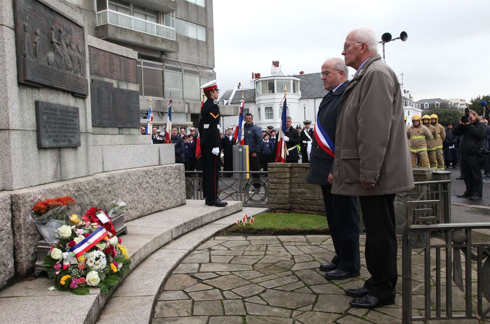 A delegation from Folkestone's twin town of Etaples-sur-Mer pay their respects after laying their wreath at a Remembrance service in Folkestone. Picture: Brian Brown
