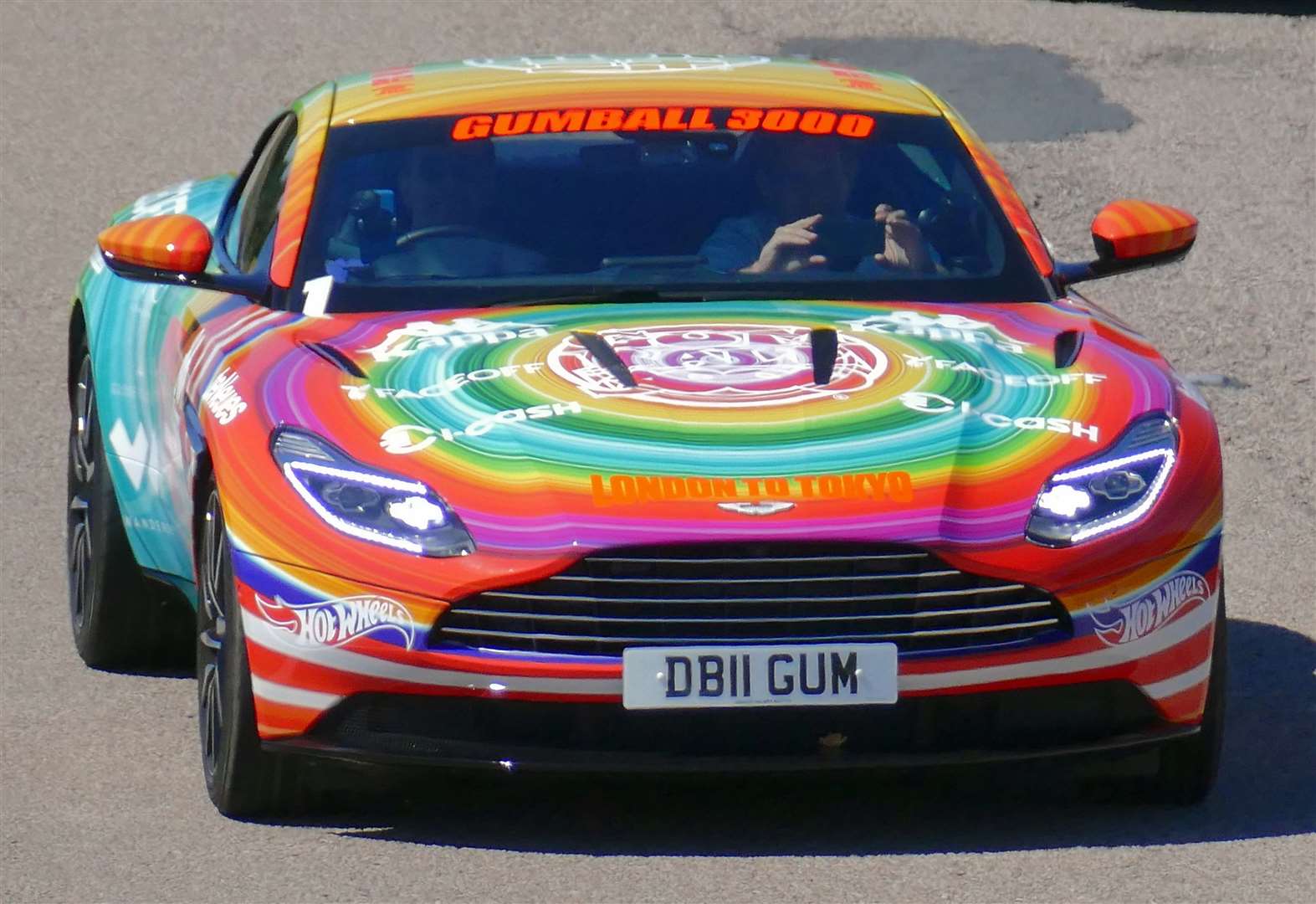 An Aston Martin DB11 with rainbow paintwork caught the eye as it passed through Ashford in 2018. Picture: Andy Clark