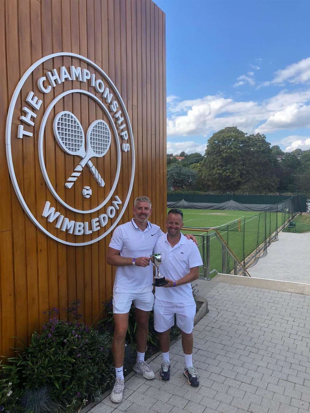 Stephen Weatherall and Zane Cheesman with the over-35s doubles trophy