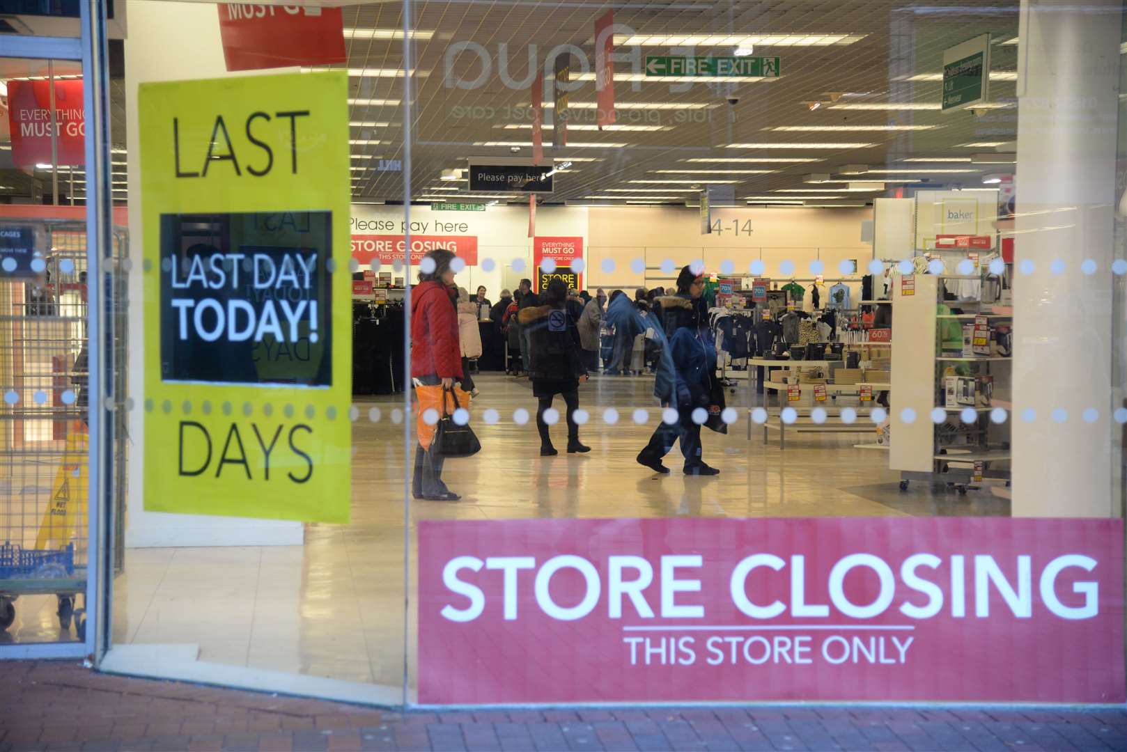 The last shoppers and staff inside the Debenhams store in Chatham which closed in 2020