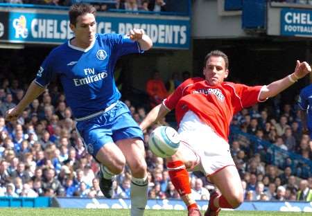 Chelsea's Frank Lampard is challenged by Radostin Kishishev during the Addicks last clash with the current champions at Stamford Bridge in May. Picture by MATTHEW WALKER