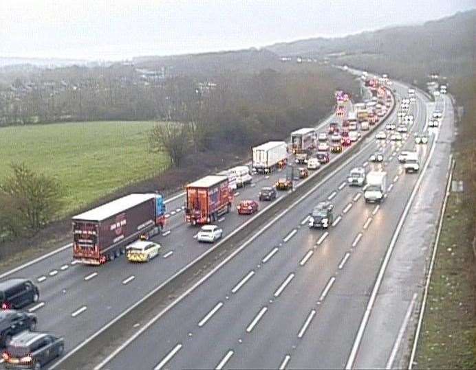 Traffic is queuing on the clockwise carriageway of the M25