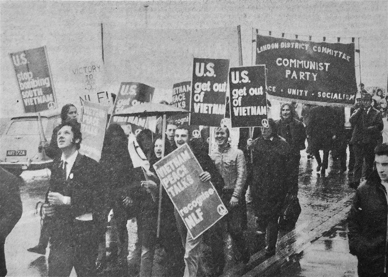 A newspaper image of marching protestors