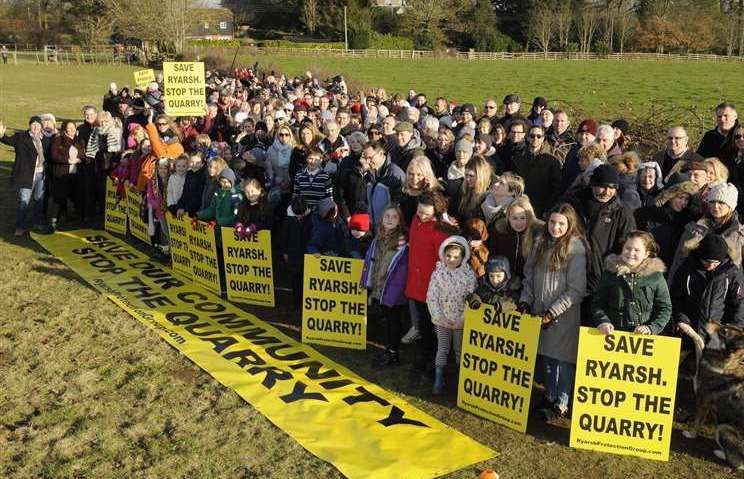 Save Ryarsh campaigners gather on farmland west of Roughetts Road in response to the original quarry plan