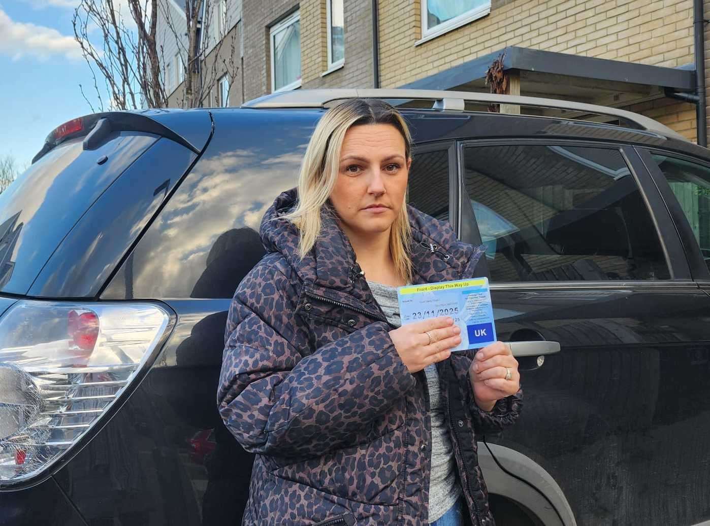 Aimee Haines, from Northfleet, holding her daughter's Blue Badge. Picture: Aimee Haines