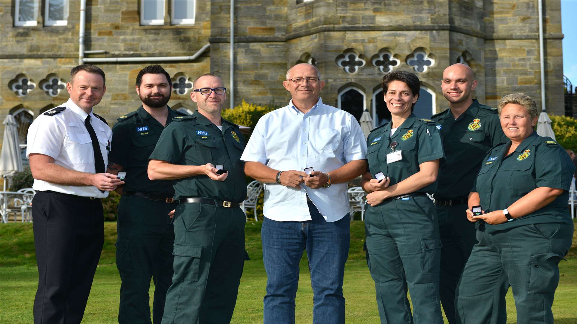 Paul Fowler with the ambulance crew who helped saved his life